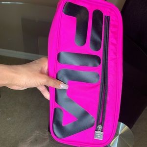 Fila crossbody or can be used as fanny pack